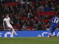 John Stones of England and Vangelis Pavlidis of Greece participate in the football game between England and Greece for the UEFA Nations Leag...