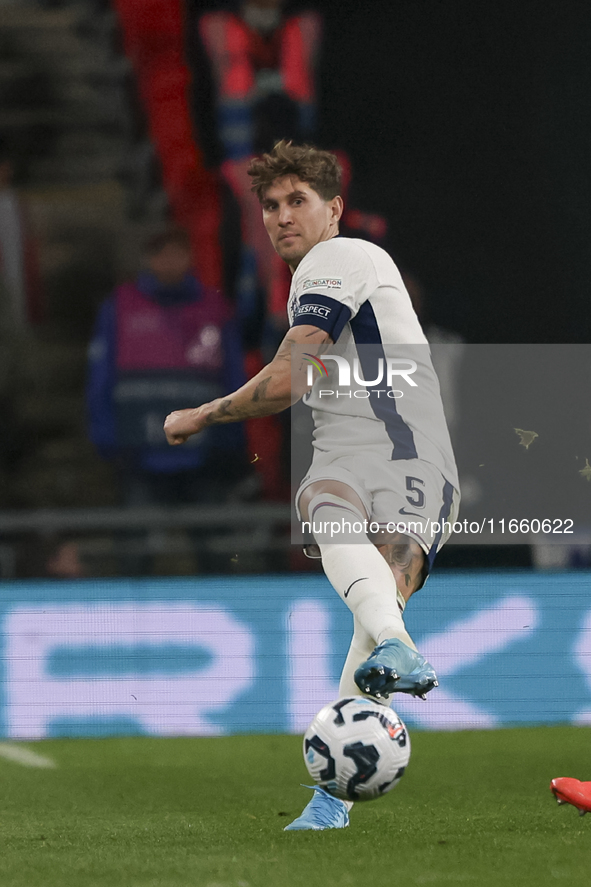 John Stones, captain of England, kicks the ball during the football game between England and Greece for the UEFA Nations League 2024/25 Leag...