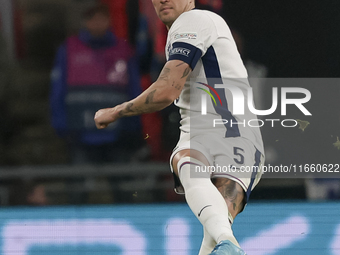 John Stones, captain of England, kicks the ball during the football game between England and Greece for the UEFA Nations League 2024/25 Leag...