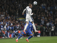 Cole Palmer of England is in the air with the ball for a header during the football game between England and Greece for the UEFA Nations Lea...