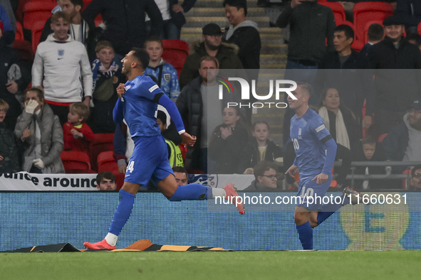 Vangelis Pavlidis of Greece celebrates his goal, followed by Dimitris Pelkas, during the football game between England and Greece for the UE...