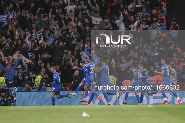 Vangelis Pavlidis of Greece celebrates his goal, followed by his teammates Dimitris Pelkas, Christos Zafeiris, Dimitris Giannoulis, Ntinos M...