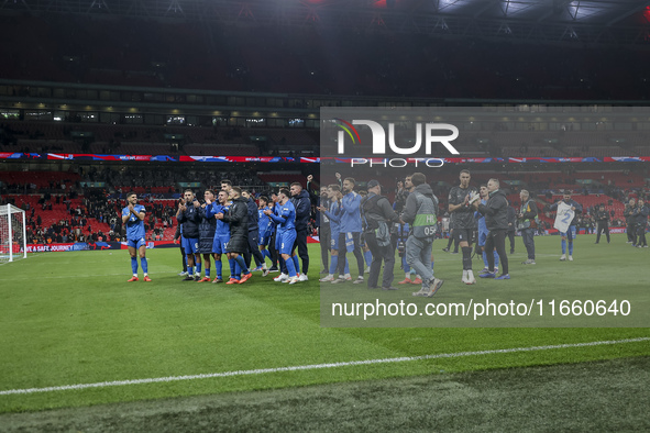 The Greek team goes to the Greek fans to celebrate and thank them, dedicating their win to their late teammate George Baldock by raising a j...