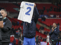 Tasos Bakasetas holds an official jersey with the name BALDOCK while he appears emotional. The Greek team heads to the Greek fans to celebra...