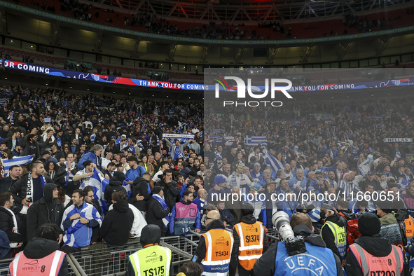 Greek fans cheer and celebrate after Greece wins the football game between England and Greece for the UEFA Nations League 2024/25 League B G...