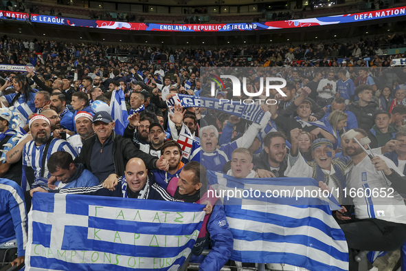 Greek fans cheer and celebrate after Greece wins the football game against England for the UEFA Nations League 2024/25 League B Group B2 mat...