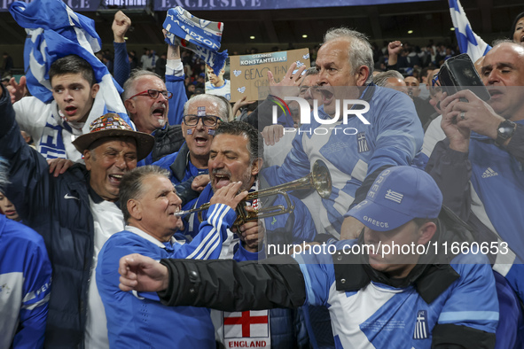 Greek fans cheer and celebrate after Greece wins the football game against England for the UEFA Nations League 2024/25 League B Group B2 mat...