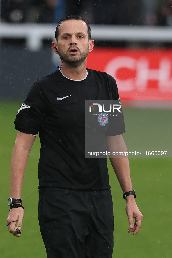 Match referee Darius Bradley officiates during the FA Cup Fourth Qualifying Round match between Hartlepool United and Brackley Town at Victo...