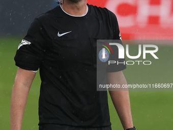 Match referee Darius Bradley officiates during the FA Cup Fourth Qualifying Round match between Hartlepool United and Brackley Town at Victo...