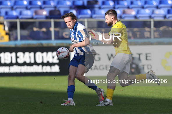 Daniel Dodds of Hartlepool United competes with Danny Newton of Brackley Town during the FA Cup Fourth Qualifying Round match between Hartle...