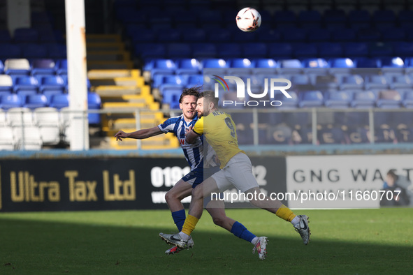 Daniel Dodds of Hartlepool United competes with Danny Newton of Brackley Town during the FA Cup Fourth Qualifying Round match between Hartle...