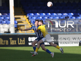 Daniel Dodds of Hartlepool United competes with Danny Newton of Brackley Town during the FA Cup Fourth Qualifying Round match between Hartle...