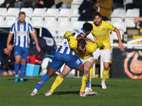 Roshaun Mathurin of Hartlepool United battles for possession with Shane Byrne of Brackley Town during the FA Cup Fourth Qualifying Round mat...