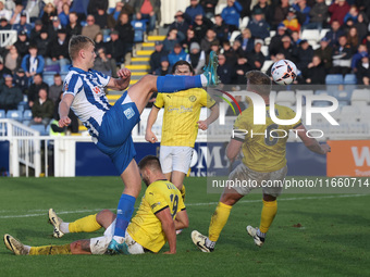 Billy Sass-Davies of Hartlepool United is in action with Brackley Town's Gareth Dean during the FA Cup Fourth Qualifying Round match between...