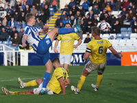 Billy Sass-Davies of Hartlepool United is in action with Brackley Town's Gareth Dean during the FA Cup Fourth Qualifying Round match between...