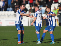 Adam Campbell of Hartlepool United celebrates with his teammates Nathan Sheron and Nicky Featherstone after scoring to level the score at 1-...