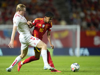 Lamine Yamal right winger of Spain and FC Barcelona and Pierre-Emile Hojbjerg defensive midfield of Denmark and Olympique Marseille compete...