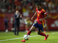 Lamine Yamal right winger of Spain and FC Barcelona controls the ball during the UEFA Nations League 2024/25 League A Group A4 match between...