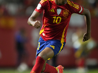 Lamine Yamal right winger of Spain and FC Barcelona controls the ball during the UEFA Nations League 2024/25 League A Group A4 match between...