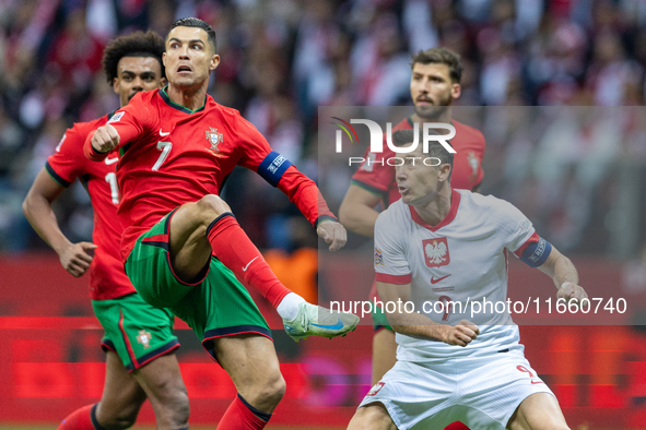 Cristiano Ronaldo and Robert Lewandowski are playing  during the  UEFA Nations League 2024 League A Group A1 match between Poland and Portug...