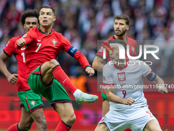 Cristiano Ronaldo and Robert Lewandowski are playing  during the  UEFA Nations League 2024 League A Group A1 match between Poland and Portug...