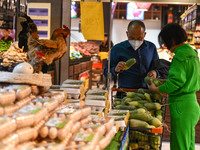 Citizens shop at a supermarket in Fuyang, China, on October 13, 2024. On the same day, the National Bureau of Statistics releases data showi...