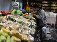 Citizens shop at a supermarket in Fuyang, China, on October 13, 2024. On the same day, the National Bureau of Statistics releases data showi...