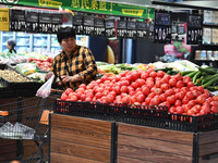 Citizens shop at a supermarket in Fuyang, China, on October 13, 2024. On the same day, the National Bureau of Statistics releases data showi...