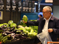 Citizens shop at a supermarket in Fuyang, China, on October 13, 2024. On the same day, the National Bureau of Statistics releases data showi...