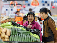 Citizens shop at a supermarket in Zaozhuang, China, on October 13, 2024. On the same day, the National Bureau of Statistics releases data sh...