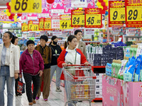 Citizens shop at a supermarket in Zaozhuang, China, on October 13, 2024. On the same day, the National Bureau of Statistics releases data sh...