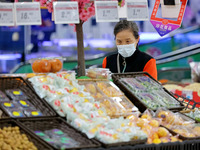 Citizens shop at a supermarket in Zaozhuang, China, on October 13, 2024. On the same day, the National Bureau of Statistics releases data sh...