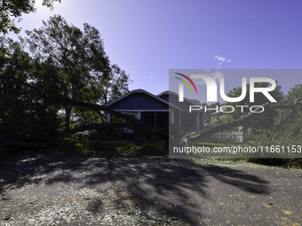 Damage occurs in the Tampa region, Florida, after Hurricane Milton hits the coast on August 9. (