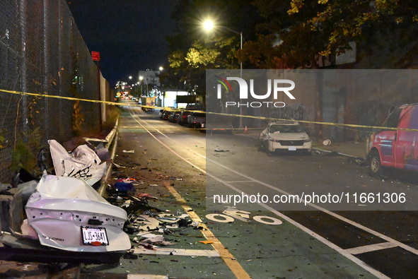 A Honda Accord is damaged at the scene. Two men are dead and two men are injured after a motor vehicle collision in the Claremont section of...