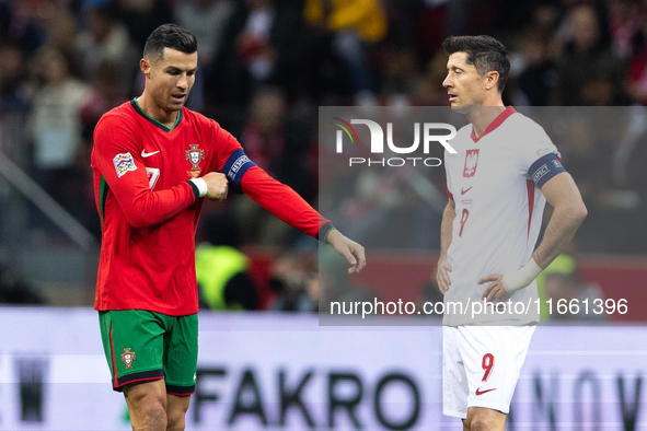 Cristiano Ronaldo and Robert Lewandowski are playing during the UEFA 2024 UEFA Nations League Group A1 match between Poland and Portugal at...