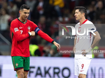 Cristiano Ronaldo and Robert Lewandowski are playing during the UEFA 2024 UEFA Nations League Group A1 match between Poland and Portugal at...