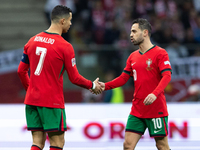 Cristiano Ronaldo and Bernardo Silva during the  UEFA Nations League 2024 League A Group A1 match between Poland and Portugal , at the PGE N...