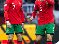 Cristiano Ronaldo and Diogo Dalot during the  UEFA Nations League 2024 League A Group A1 match between Poland and Portugal , at the PGE Naro...