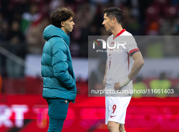 Joao Felix and  Robert Lewandowski talk after  the  UEFA Nations League 2024 League A Group A1 match between Poland and Portugal , at the PG...