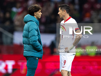 Joao Felix and  Robert Lewandowski talk after  the  UEFA Nations League 2024 League A Group A1 match between Poland and Portugal , at the PG...