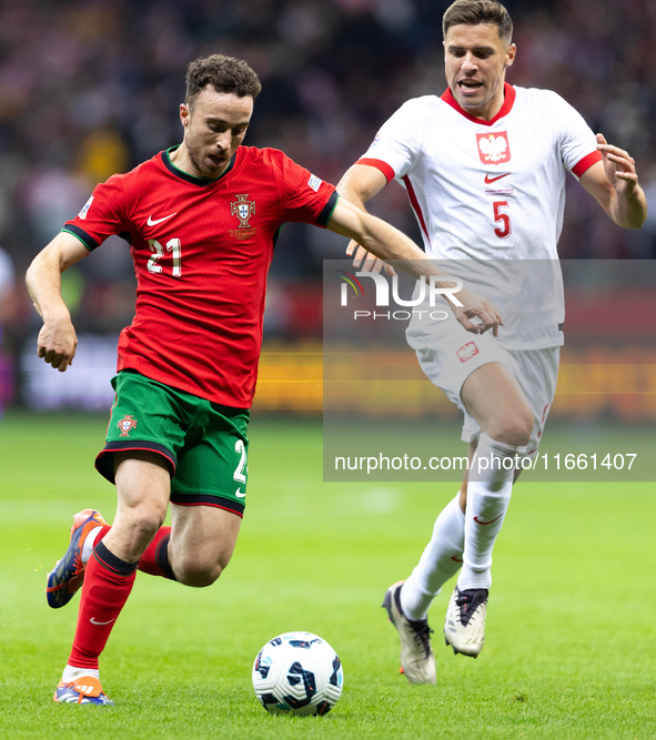 Diogo Jota and Jan Bednarek compete during the  UEFA Nations League 2024 League A Group A1 match between Poland and Portugal , at the PGE Na...