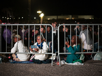 Pilgrims hold candles and pray during the candle procession at the Sanctuary of Fatima, in Fatima, Portugal, on October 12, 2024, on the ann...