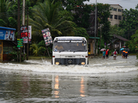 A lorry moves on the flooded road in Kelaniya, Sri Lanka, on October 13, 2024. The adverse weather affects approximately 76,218 people from...