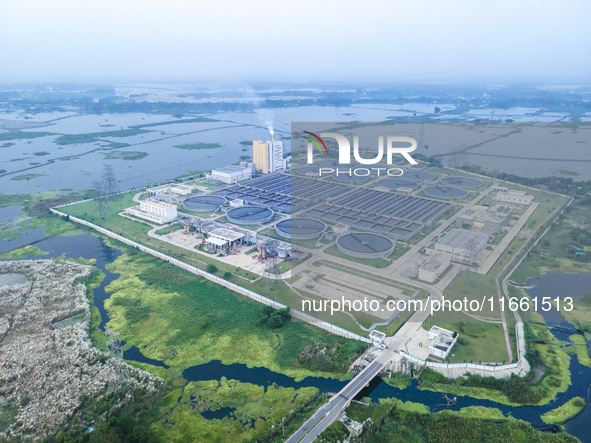 An aerial view shows the largest sewage treatment plant in Dasherkandi in Dhaka, Bangladesh, on October 12, 2024. 