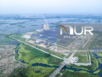 An aerial view shows the largest sewage treatment plant in Dasherkandi in Dhaka, Bangladesh, on October 12, 2024. (