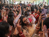 A Hindu devotee dances to celebrate the Durga Puja in Dhaka, Bangladesh, on October 13, 2024. (