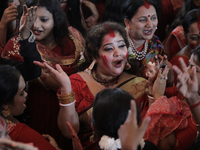 A Hindu devotee dances to celebrate the Durga Puja in Dhaka, Bangladesh, on October 13, 2024. (