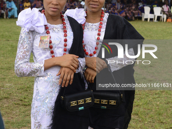 Kehinde Oladapo and Taiwo Oladapo, female twins, pose for a photograph during the 2024 edition of the annual World Twins Festival in Igbo-Or...