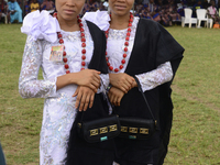 Kehinde Oladapo and Taiwo Oladapo, female twins, pose for a photograph during the 2024 edition of the annual World Twins Festival in Igbo-Or...