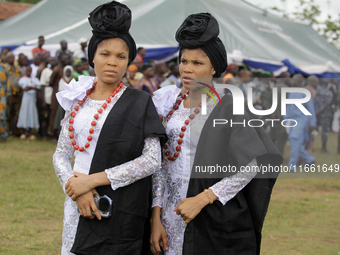 Kehinde Oladapo and Taiwo Oladapo, female twins, pose for a photograph during the 2024 edition of the annual World Twins Festival in Igbo-Or...